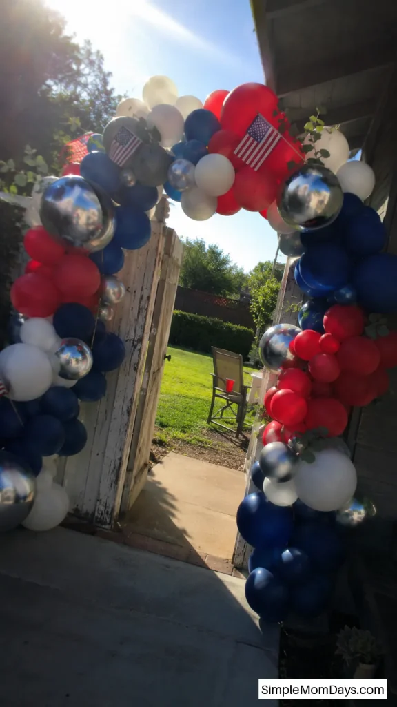 Build a Red, White, and Blue Balloon Arch at the Entrance