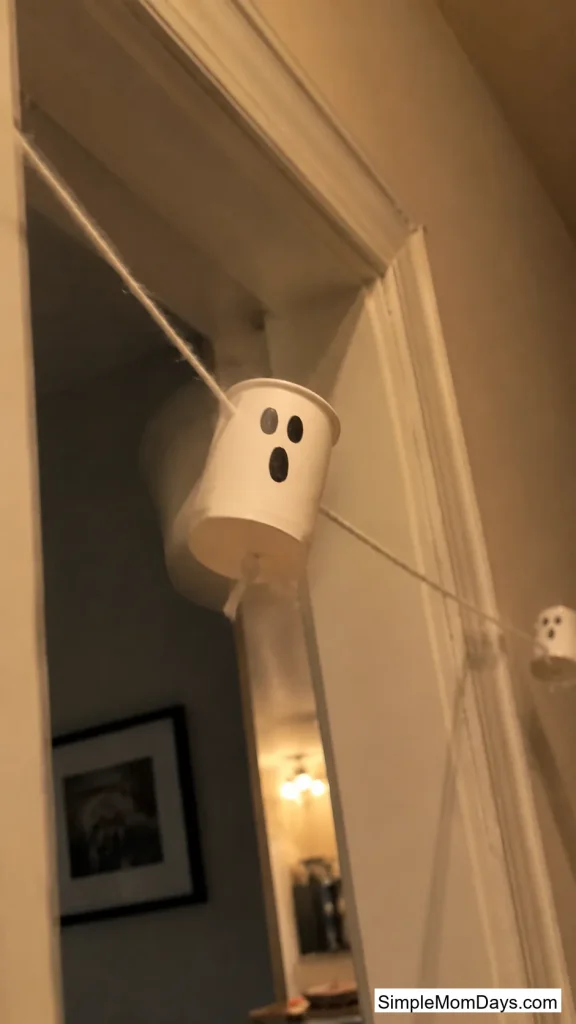 String-Pull Flying Ghost Cup