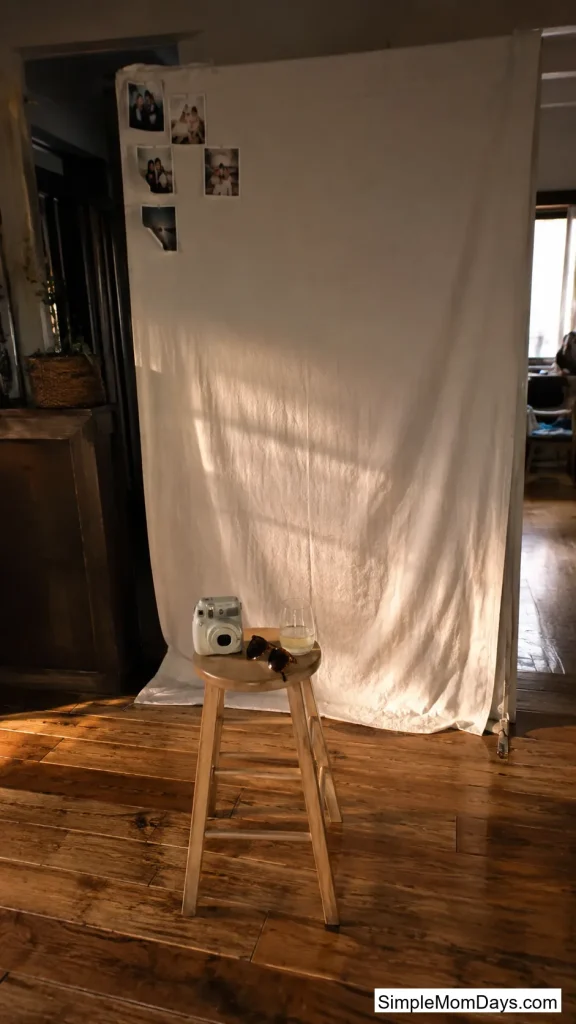 An Instant-Camera Backdrop Guests Can Pose In Front Of