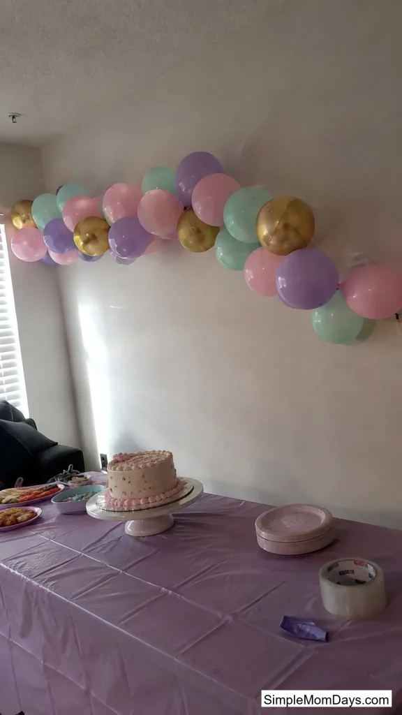 A Balloon Garland Over the Food Table